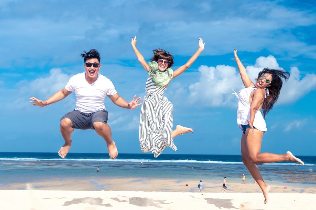 Beachgoers Enjoying the Heat of Summer